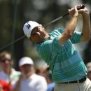 Fred Couples of the U.S. hits his tee shot on the first hole during final round play in the 2012 Masters Golf Tournament at the Augusta National Golf Club in Augusta, Georgia, April 8, 2012. REUTERS/Brian Snyder
