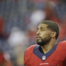 Houston Texans running back Arian Foster pauses on the field before an NFL football game against the Indianapolis Colts, Sunday, Nov. 3, 2013, in Houston. (AP Photo/Patric Schneider)