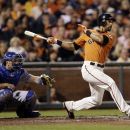 San Francisco Giants' Angel Pagan drives in a run with a single against the Los Angeles Dodgers during the third inning of a baseball game Friday, Sept. 7, 2012, in San Francisco. (AP Photo/Marcio Jose Sanchez)