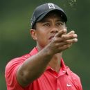 Tiger Woods squeaks out a win at Congressional (The Associated Press)