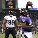 Baltimore Ravens running back Vonta Leach, right, celebrates in front of Jacksonville Jaguars defensive tackle Terrance Knighton after scoring a touchdown in the second half of an NFL preseason football game in Baltimore, Thursday, Aug. 23, 2012. (AP Photo/Nick Wass)