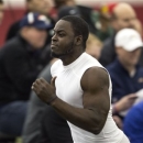 Running back Montee Ball runs the 40-yard dash during NFL football pro day held at the University of Wisconsin Wednesday, March 6, 2013, in Madison, Wis. (AP Photo/Tom Lynn)
