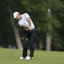 Charl Schwartzel, of South Africa, hits from the 13th fairway during the first round of the Memorial golf tournament  Thursday, May 30, 2013, in Dublin, Ohio. (AP Photo/Darron Cummings)