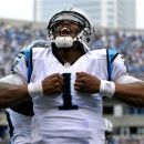 Carolina Panthers' Cam Newton (1) reacts after running for a touchdown against the New Orleans Saints during the fourth quarter of an NFL football game in Charlotte, N.C., Sunday, Sept. 16, 2012. The Panthers won 35-27. (AP Photo/Rainier Ehrhardt)