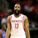 HOUSTON - APRIL 29:  James Harden #13 of the Houston Rockets reacts after Houston takes the lead in the fourth quarter against the Oklahoma City Thunder during Game Four of the Western Conference Quarterfinals of the 2013 NBA Playoffs at the Toyota Center on April 29, 2013 in Houston, Texas. Houston won 105-103. (Photo by Bob Levey/Getty Images)