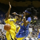 UCLA guard Markel Walker, right, is stopped while going to the basket by California guard Afure Jemerigbe, left, during the first half of their NCAA college basketball game on Sunday, Jan. 20, 2013, in Berkeley, Calif. (AP Photo/Eric Risberg)