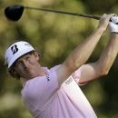 Brandt Snedeker hits his tee shot on the 13th hole during the final round of play in the Tour Championship golf tournament in Atlanta, Sunday, Sept. 23, 2012. Snedeker won the tournament. (AP Photo/John Bazemore)