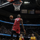 CLEVELAND, OH - MARCH 20: LeBron James #6 of the Miami Heat goes up for the dunk against Wayne Ellington #21 of the Cleveland Cavaliers at The Quicken Loans Arena on March 20, 2013 in Cleveland, Ohio. (Photo by David Liam Kyle/NBAE via Getty Images)