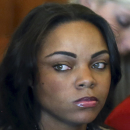 FILE - In this Sept. 6, 2013 file photo, Shayanna Jenkins, fiancee of former New England Patriots player Aaron Hernandez, sits in superior court during arraignment for Hernandez in Fall River, Mass. A Massachusetts prosecutor said Friday, Sept. 27, 2013, that a grand jury indicted Jenkins on a single count of perjury in relation to the investigation into the June 17 killing of Odin Lloyd. Lloyd had been dating Jenkins' sister. Hernandez has pleaded not guilty to first-degree murder in Lloyd's death and is being held without bail. (AP Photo/ The Boston Globe, Jonathan Wiggs, Pool, File )