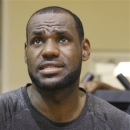 Miami Heat forward LeBron James speaks during an interview after NBA basketball training camp, Tuesday, Oct. 2, 2012 in Miami. (AP Photo/Wilfredo Lee)