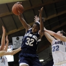 Notre Dame's Jewell Loyd (32) pulls in a rebound over Villanova's Devon Kane (22) during the first half of an NCAA college basketball game, Tuesday, Feb. 5, 2013, in Villanova, Pa. (AP Photo/Michael Perez)