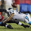 Tampa Bay Buccaneers wide receiver Mike Williams (19) loses the ball as he is hit by Carolina Panthers free safety Mike Mitchell, right, during the third quarter of an NFL football game on Thursday, Oct. 24, 2013, in Tampa, Fla. (AP Photo/Chris O'Meara)