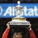 Louisville head coach Charlie Strong celebrates following a 33-23 win over Florida in the Sugar Bowl NCAA college football game Wednesday, Jan. 2, 2013, in New Orleans. (AP Photo/Butch Dill)