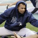 New York Yankees' Alex Rodriguez stretches prior to batting practice before the Yankees' baseball game against the Minnesota Twins, Tuesday, Sept. 25, 2012, in Minneapolis. (AP Photo/Jim Mone)