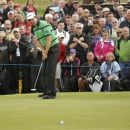 Ireland's Padraig Harrington putts a birdie on the 17th hole during day two of the Irish Open Golf Championship at Royal Portrush Golf Club, Portrush, Northern Ireland, Friday, June 29, 2012.  (AP Photo/Peter Morrison)