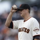 San Francisco Giants' Matt Cain adjusts his cap in the first inning of a baseball game against the Los Angeles Dodgers, Sunday, May 5, 2013, in San Francisco. (AP Photo/Ben Margot)