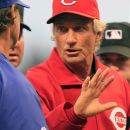 Cincinnati Reds acting manager Chris Speier goes over the ground rules prior to the start of a baseball game against the Los Angeles Dodgers, Friday, Sept. 21, 2012, in Cincinnati. (AP Photo/Al Behrman)