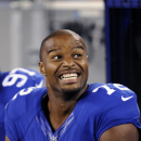 New York Giants defensive end Osi Umenyiora reacts during the second half of an NFL preseason football game against the Chicago Bears Friday, Aug. 24, 2012, in East Rutherford, N.J. The Bears won the game 20-17. (AP Photo/Bill Kostroun)