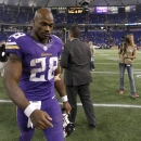 Minnesota Vikings running back Adrian Peterson (28) walks off the field after an NFL football game against the Green Bay Packers, Sunday, Oct. 27, 2013, in Minneapolis. (AP Photo/Ann Heisenfelt)