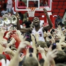 North Carolina State's C.J. Leslie (5) celebrates with the fans after the Wolfpack's 84-76 win over top-ranked Duke in Raleigh, N.C., Saturday, Jan. 12, 2013. (AP Photo/The News & Observer, Ethan Hyman)