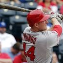 Los Angeles Angels' Mark Trumbo hits a three-run home run during the second inning of a baseball game against the Kansas City Royals, Sunday, Sept. 16, 2012, in Kansas City, Mo. (AP Photo/Charlie Riedel)