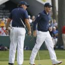 USA's Phil Mickelson and Keegan Bradley putt on the 13th hole during a practice round at the Ryder Cup PGA golf tournament Thursday, Sept. 27, 2012, at the Medinah Country Club in Medinah, Ill. (AP Photo/Charles Rex Arbogast)