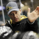Dallas Stars head coach Glen Gulutzan speaks to players on the bench during NHL hockey training camp in Frisco, Texas, Tuesday, Jan. 15, 2013. (AP Photo/LM Otero)