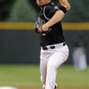 Colorado Rockies starting pitcher Alex White delivers against the Seattle Mariners during the first inning of an interleague baseball game, Friday, May 18, 2012, in Denver. (AP Photo/Jack Dempsey)