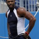 Tennessee Titans receiver Kenny Britt watches from the sideline during NFL football camp at LP Field, Saturday, Aug. 4, 2012, Nashville, Tenn. (AP Photo/Wade Payne)