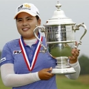 nbee Park of South Korea holds the 2013 Harton S. Semple Trophy after winning the 2013 U.S. Women's Open golf championship at the Sebonack Golf Club in Southampton, New York June 30, 2013. REUTERS/Adam Hunge