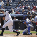 New York Yankees designated hitter Alex Rodriguez (13) follows through on a three-run home run to left field against the Kansas City Royals during the third inning of a baseball game, Wednesday, May 27, 2015, in New York. (AP Photo/Julie Jacobson)