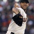 San Francisco Giants' Madison Bumgarner works against the San Diego Padres in the first inning of a baseball game, Saturday, Sept 22, 2012, in San Francisco. (AP Photo/Ben Margot)
