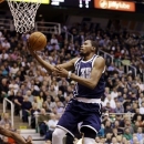 Oklahoma City Thunder's Kevin Durant (35) lays the ball up in the second quarter of an NBA basketball game against the Utah Jazz, Tuesday, Feb. 12, 2013, in Salt Lake City. (AP Photo/Rick Bowmer)