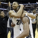 Georgetown forward Otto Porter Jr. (22) celebrates with guard Jabril Trawick (55) after defeating No. 5 Louisville 53-51 in am NCAA college basketball game, Saturday, Jan. 26, 2013, in Washington. (AP Photo/Alex Brandon)