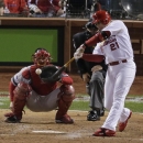 St. Louis Cardinals' Allen Craig hits a single during the ninth inning of Game 4 of baseball's World Series against the Boston Red Sox Sunday, Oct. 27, 2013, in St. Louis. (AP Photo/Charlie Riedel)