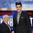 NBA Commissioner David Stern, left, shakes hands with Pittsburgh's Steven Adams, who was selected by the Oklahoma City Thunder in the first round of the NBA basketball draft, Thursday, June 27, 2013, in New York. (AP Photo/Kathy Willens)
