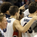 Gonzaga's coach Mark Few, left, celebrates with his team after their West Coast Conference Championship win in an NCAA college basketball game against Portland, Saturday, March 2, 2013, in Spokane, Wash. Gonzaga defeated Portland 81-52. (AP Photo/Jed Conklin)