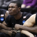Wichita State's Cleanthony Early, left, and Carl Hall lock arms as they watch the last few seconds against Gonzaga during a third-round game in the NCAA men's college basketball tournament in Salt Lake City on Saturday, March 23, 2013. Wichita State won 76-70. (AP Photo/George Frey)