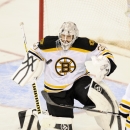 Boston Bruins goalie Tim Thomas (30) looks for the puck during the second period of Game 6 of an NHL hockey Stanley Cup first-round playoff series Washington Capitals, Sunday, April 22, 2012, in Washington. (AP Photo/Nick Wass)