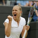Kaia Kanepi of Estonia celebrates after beating Laura Robson of Britain during a Women's singles match at the All England Lawn Tennis Championships in Wimbledon, London, Monday, July 1, 2013. (AP Photo/Sang Tan)