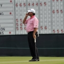 Boo Weekley reacts after missing a par putt on the ninth hole during the second round of The McGladrey Classic PGA Tour golf tournament, Friday, Oct. 19, 2012, in St. Simons Island, Ga. (AP Photo/Stephen Morton)