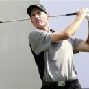 Jim Furyk of the U.S. hits a drive from the sixteenth tee during round one of the BMW Championship golf tournament in Carmel, Indiana September 6, 2012. REUTERS/Brent Smith