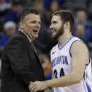 FILE - In this Jan. 8, 2013 file photo, Creighton's Ethan Wragge is congratulated by coach Greg McDermott during the second half of an NCAA college basketball game against Drake in Omaha, Neb. When Wragge is at his best, Creighton has been almost unbeatable. When he's struggling, so do the Bluejays. He'll be a big part of the game plan Friday against defensive-minded Cincinnati in the NCAA Midwest Regional in Philadelphia.(AP Photo/Nati Harnik)