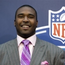 E.J. Manuel from Florida State arrives on the red carpet before the first round of the NFL football draft, Thursday, April 25, 2013 at Radio City Music Hall in New York.(AP Photo/Craig Ruttle)
