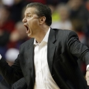 Kentucky head coach John Calipari directs his team during the second half of an NCAA college basketball game against Vanderbilt the Southeastern Conference tournament, Friday, March 15, 2013, in Nashville, Tenn. (AP Photo/Dave Martin)