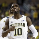 Michigan guard Tim Hardaway Jr. celebrates after a basket during the first half of an NCAA college basketball game against Northwestern in Ann Arbor, Mich., Wednesday, Jan. 30, 2013. (AP Photo/Carlos Osorio)
