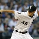 Chicago White Sox pitcher Chris Sale delivers during the first inning of a baseball game against the New York Yankees, Wednesday, Aug. 22, 2012, in Chicago. (AP Photo/Charles Rex Arbogast)