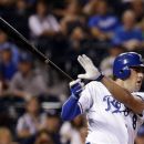 Kansas City Royals' Mike Moustakas hits an RBI double during the eighth inning of a baseball game against the Detroit Tigers, Tuesday, Aug. 28, 2012, in Kansas City, Mo. The Royals won 9-8. (AP Photo/Charlie Riedel)