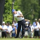 Michael Allen hits his approach shot on the 16th hole during the second round of the Senior PGA Championship golf tournament at the Harbor Shores Golf Club in Benton Harbor, Mich., Friday, May 25, 2012. (AP Photo/Carlos Osorio)