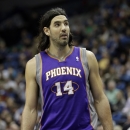 Phoenix Suns' Luis Scola of Argentina is shown in the first quarter of an NBA basketball game against the Minnesota Timberwolves Saturday, April 13, 2013 in Minneapolis. (AP Photo/Jim Mone)
